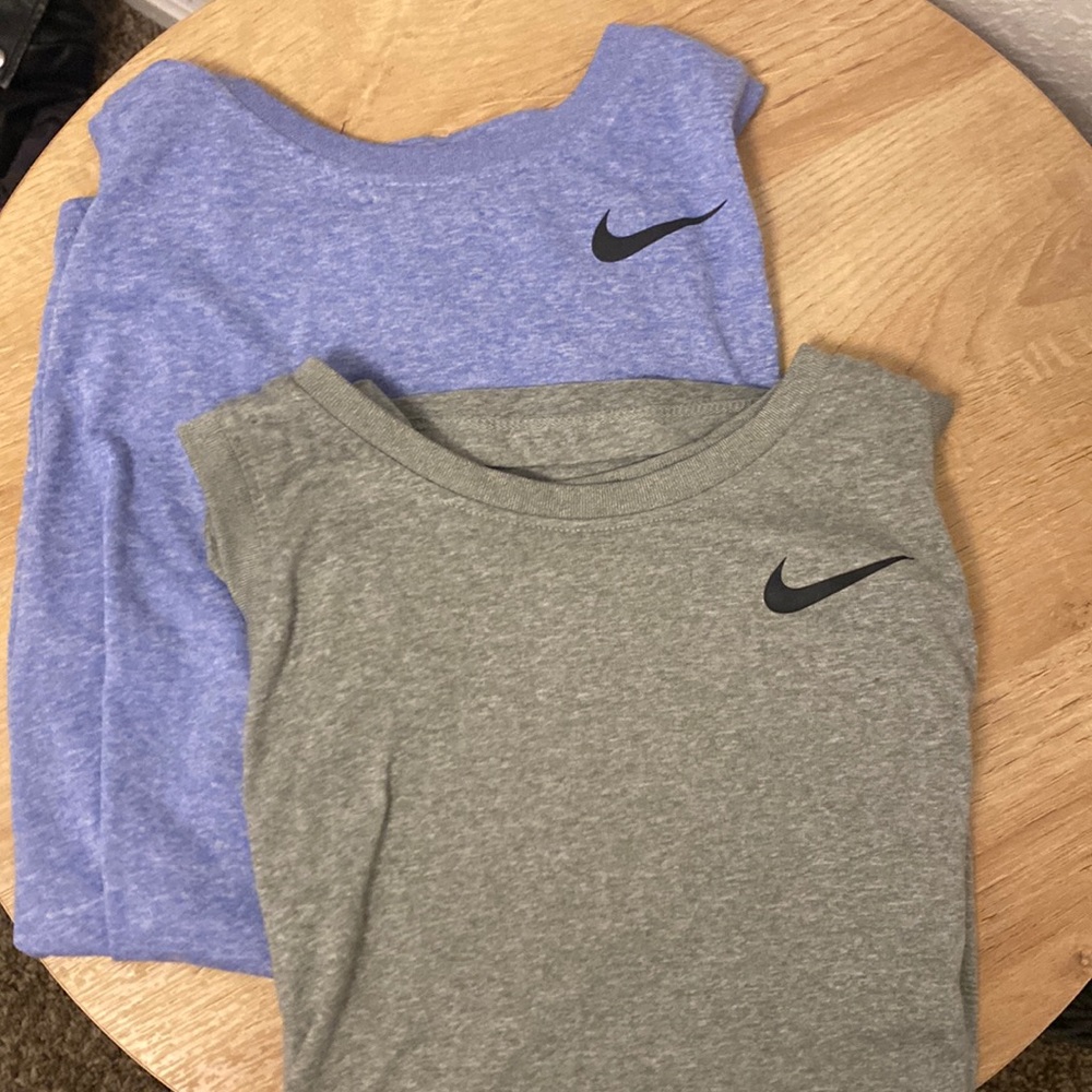 Two Nike tank tops. One blue-M one gray- S